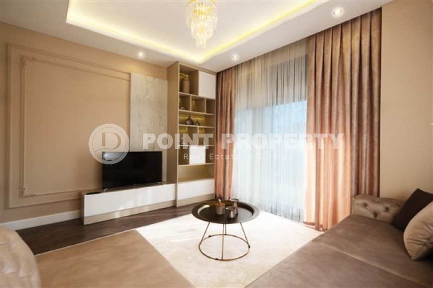 Новые благоустроенные апартаменты с тремя спальными комнатами в центральном районе города Аланья-id-5313-фото-4