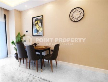 Новые благоустроенные апартаменты с тремя спальными комнатами в центральном районе города Аланья-id-5313-фото-5