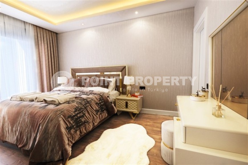 Новые благоустроенные апартаменты с тремя спальными комнатами в центральном районе города Аланья-id-5313-фото-6