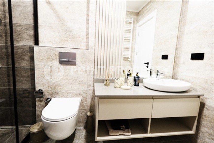 Новые благоустроенные апартаменты с тремя спальными комнатами в центральном районе города Аланья-id-5313-фото-9