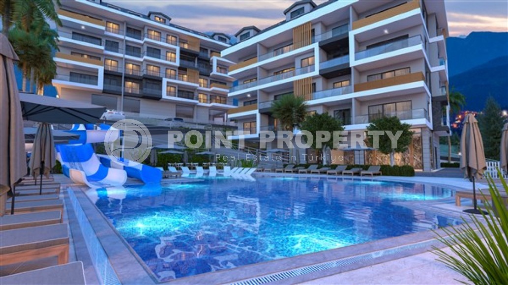 Новые благоустроенные апартаменты с тремя спальными комнатами в центральном районе города Аланья-id-5313-фото-13