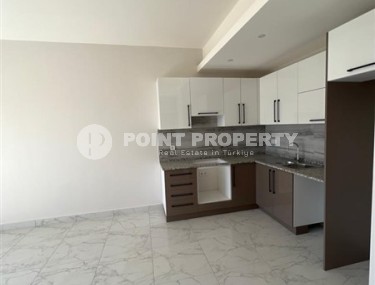 Небольшие не меблированные апартаменты с одной спальной комнатой, в районе Авсаллар-id-5314-фото-3