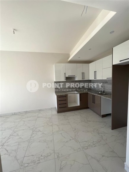 Небольшие не меблированные апартаменты с одной спальной комнатой, в районе Авсаллар-id-5314-фото-3