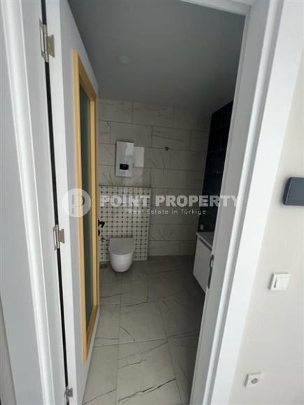 Небольшие не меблированные апартаменты с одной спальной комнатой, в районе Авсаллар-id-5314-фото-6