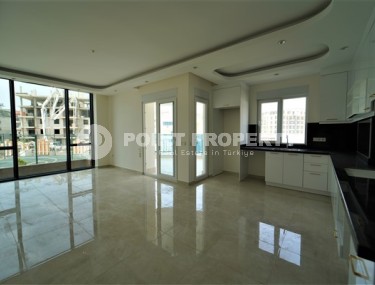 Новые светлые апартаменты с двумя спальными комнатами в современном жилом комплексе, в городе Газипаша-id-5316-фото-4