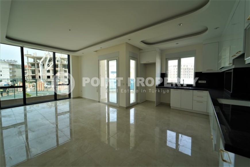 Новые светлые апартаменты с двумя спальными комнатами в современном жилом комплексе, в городе Газипаша-id-5316-фото-4