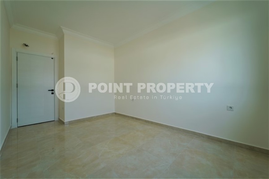 Новые светлые апартаменты с двумя спальными комнатами в современном жилом комплексе, в городе Газипаша-id-5316-фото-7