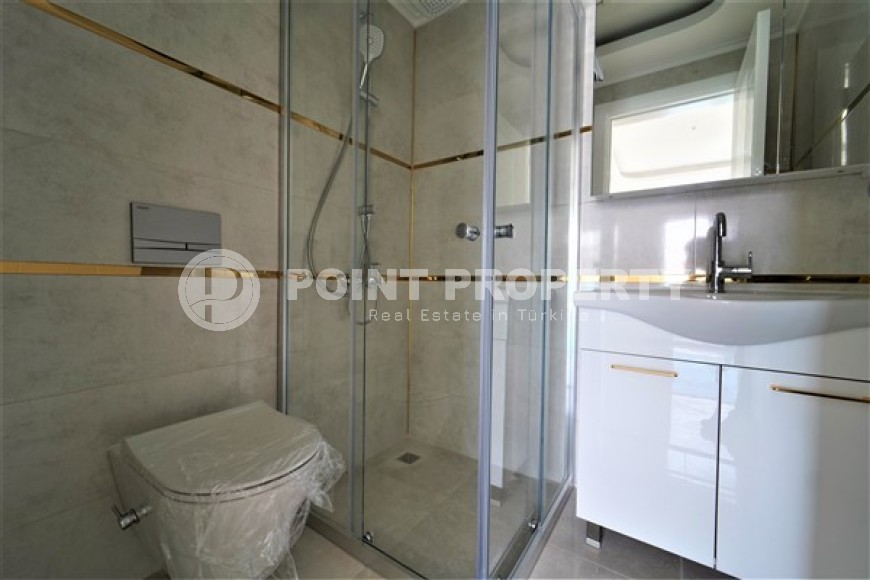 Новые светлые апартаменты с двумя спальными комнатами в современном жилом комплексе, в городе Газипаша-id-5316-фото-11