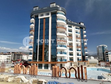 Новые светлые апартаменты с двумя спальными комнатами в современном жилом комплексе, в городе Газипаша-id-5316-фото-1