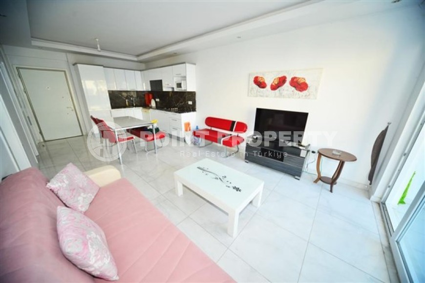 Апартаменты с мебелью и бытовой техникой на 4-м этаже в резиденции 2021 года постройки, в центре района Махмутлар-id-5318-фото-1