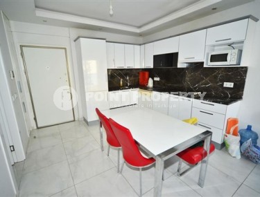 Apartment with furniture and household appliances on the 4th floor in a residence built in 2021, in the center of Mahmutlar-id-5318-photo-3