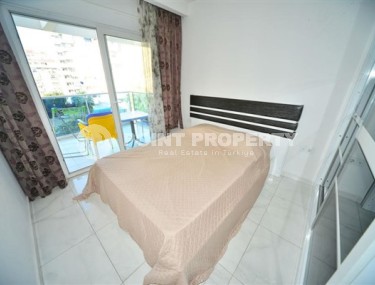 Apartment with furniture and household appliances on the 4th floor in a residence built in 2021, in the center of Mahmutlar-id-5318-photo-4