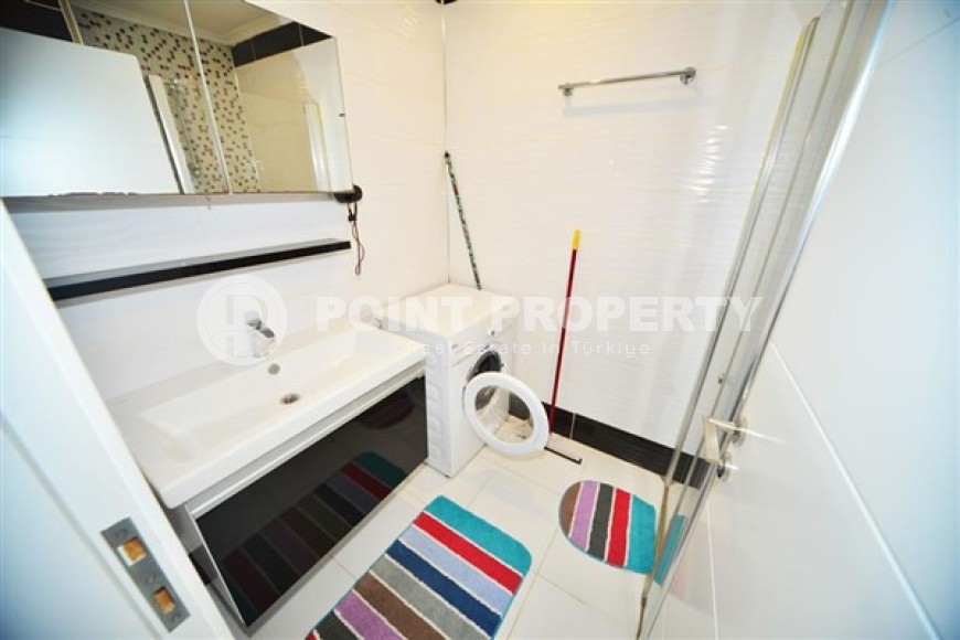 Апартаменты с мебелью и бытовой техникой на 4-м этаже в резиденции 2021 года постройки, в центре района Махмутлар-id-5318-фото-5