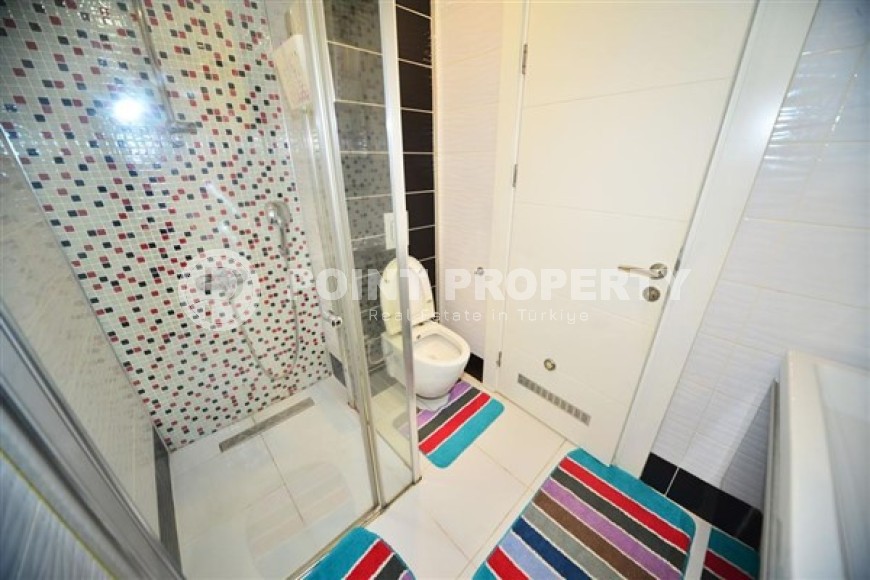 Апартаменты с мебелью и бытовой техникой на 4-м этаже в резиденции 2021 года постройки, в центре района Махмутлар-id-5318-фото-6