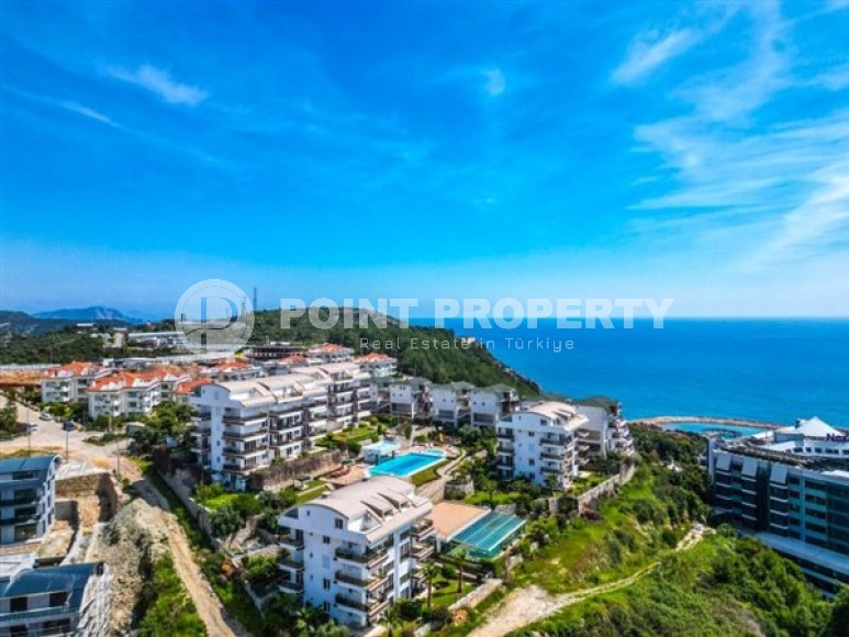 Светлые апартаменты с видом на Средиземное море, планировкой 2+1, в районе города Аланья - Конаклы-id-5327-фото-16