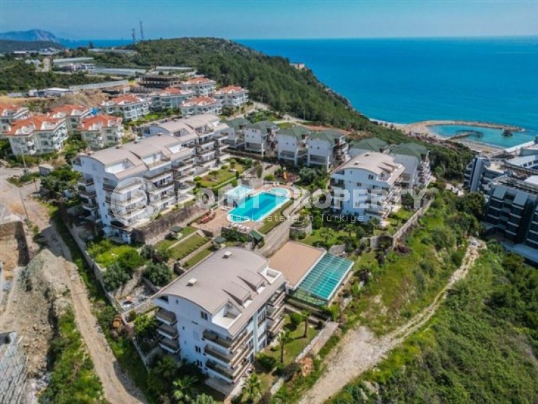 Светлые апартаменты с видом на Средиземное море, планировкой 2+1, в районе города Аланья - Конаклы-id-5327-фото-17