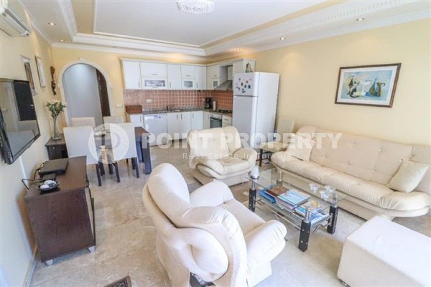 Furnished apartment with two bedrooms, in a residential complex overlooking the Taurus Mountains, in the central area of Alanya-id-5330-photo-1