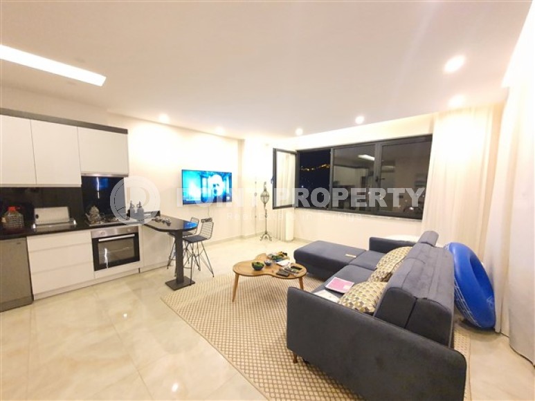 Светлые просторные апартаменты 1+1, общей площадью 75 м2, в 650 метрах от знаменитого пляжа Клеопатры-id-5339-фото-2