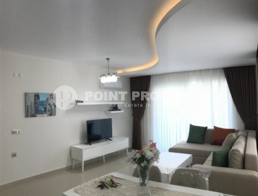 Комфортабельные апартаменты с хорошим качественным ремонтом, новой мебелью и бытовой техникой в центре района Махмутлар-id-5348-фото-2