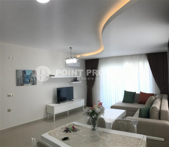 Комфортабельные апартаменты с хорошим качественным ремонтом, новой мебелью и бытовой техникой в центре района Махмутлар-id-5348-фото-2