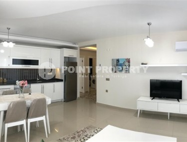 Комфортабельные апартаменты с хорошим качественным ремонтом, новой мебелью и бытовой техникой в центре района Махмутлар-id-5348-фото-4