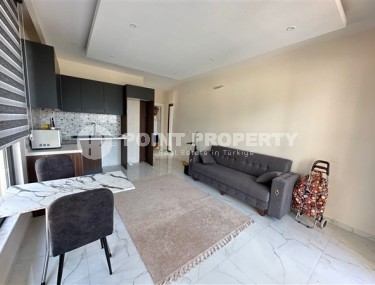 Compact apartment 1+1, with a total area of 55 m2, on the 1st floor in a new building, commissioned in 2023-id-5349-photo-1