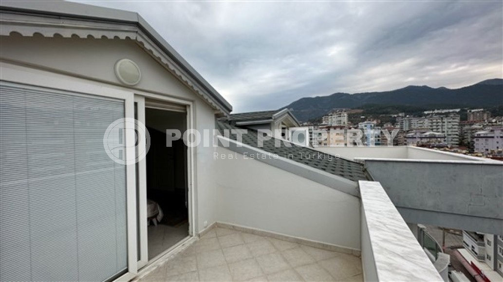 Panoramic duplex 3+2 on the 10th floor with attic in the center of a quiet, comfortable area of Alanya - Cikcilli-id-5350-photo-12