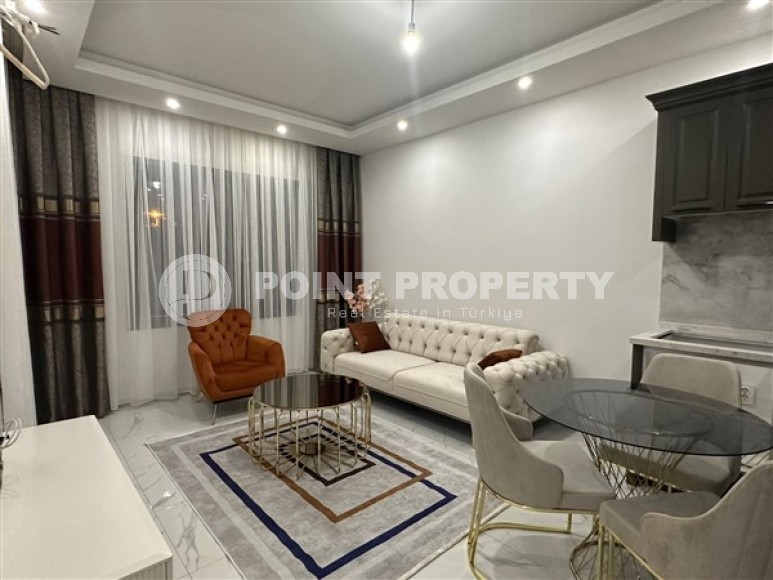 Небольшая светлая квартира в двух с половиной километрах от моря в районе Чиплаклы-id-5352-фото-3