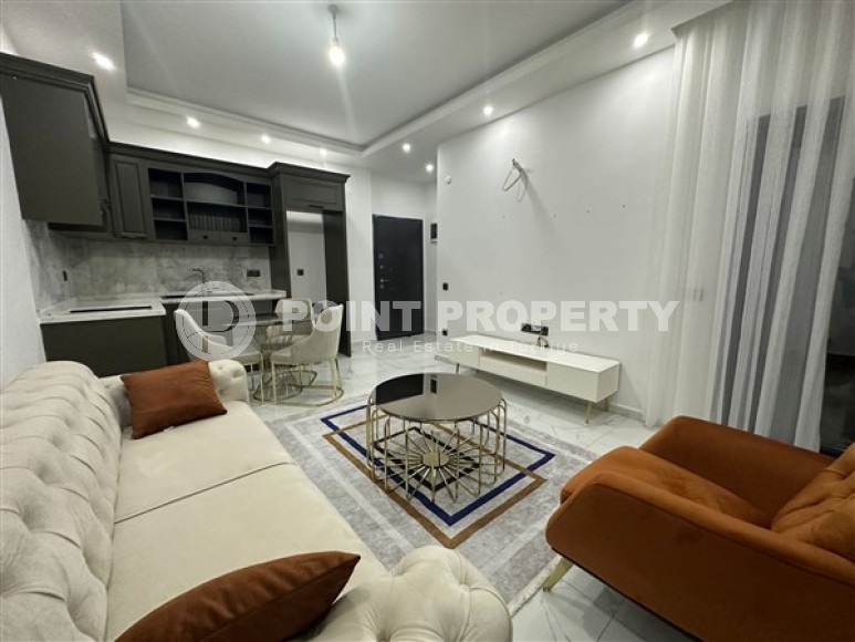 Небольшая светлая квартира в двух с половиной километрах от моря в районе Чиплаклы-id-5352-фото-2