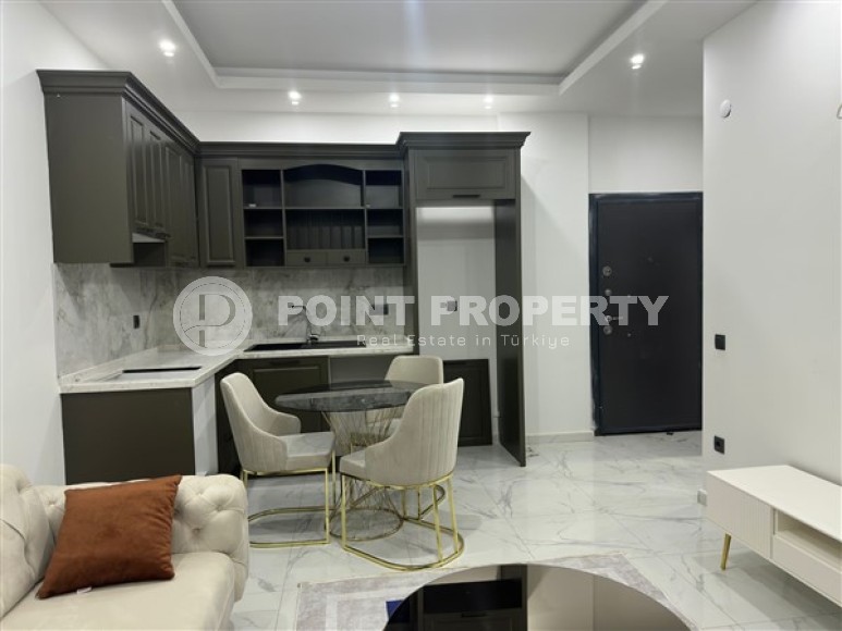 Небольшая светлая квартира в двух с половиной километрах от моря в районе Чиплаклы-id-5352-фото-4