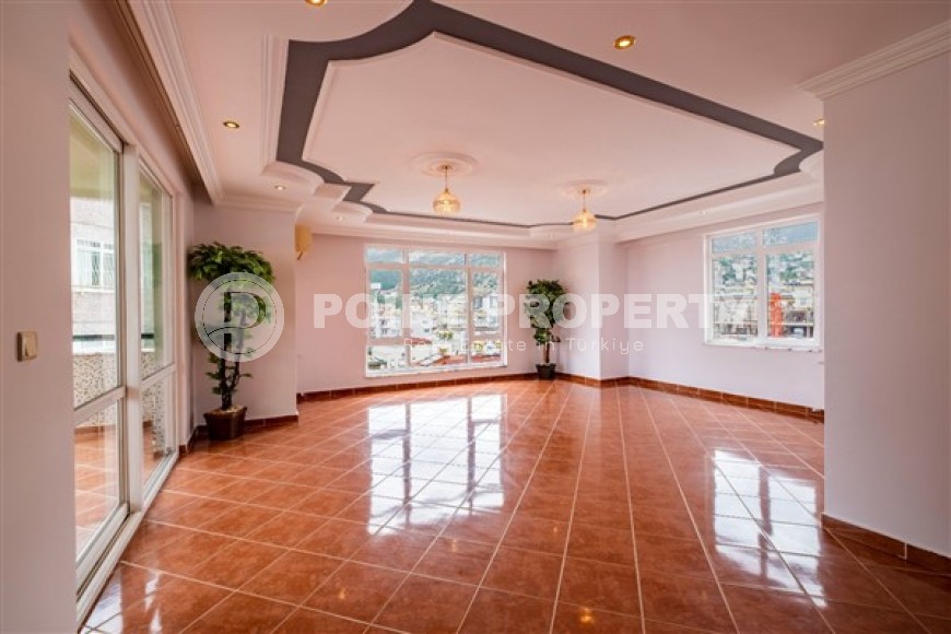 Spacious 3+1 apartment with panoramic views of the city and the Taurus Mountains 800 meters from the sea-id-5353-photo-3