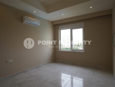 Светлые апартаменты с одной спальной комнатой, в чистовой отделке, в зеленом районе города Аланья - Авсаллар-id-5358-фото-4