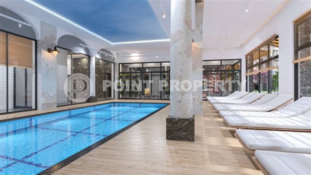 Светлые апартаменты с одной спальной комнатой, в чистовой отделке, в зеленом районе города Аланья - Авсаллар-id-5358-фото-10