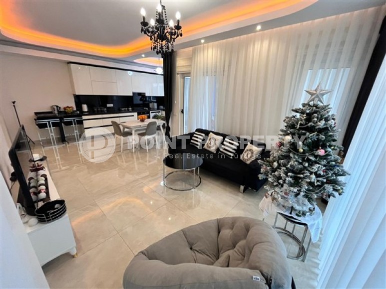 Bright furnished apartment with two bedrooms, in a modern residential complex near the Mediterranean Sea, in the Mahmutlar area-id-5360-photo-1