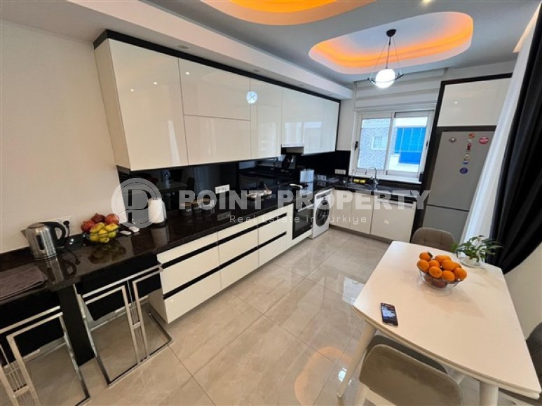 Bright furnished apartment with two bedrooms, in a modern residential complex near the Mediterranean Sea, in the Mahmutlar area-id-5360-photo-2