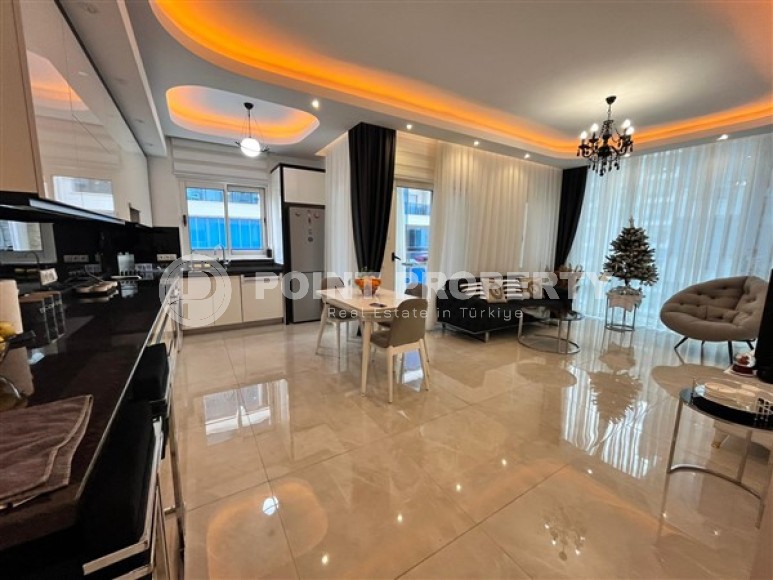 Bright furnished apartment with two bedrooms, in a modern residential complex near the Mediterranean Sea, in the Mahmutlar area-id-5360-photo-3