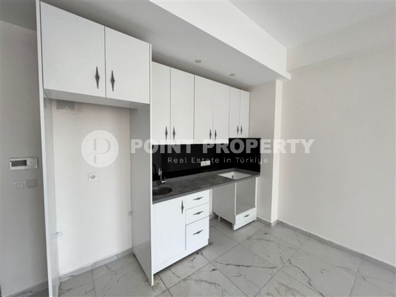 Квартира с одной спальной комнатой в жилом комплексе 2022 года постройки, в районе Авсаллар-id-5361-фото-2