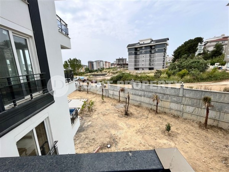 Квартира с одной спальной комнатой в жилом комплексе 2022 года постройки, в районе Авсаллар-id-5361-фото-6