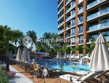 Апартаменты с одной спальной комнатой в жилом комплексе на завершающем этапе строительства, в районе города Аланья - Авсаллар-id-5362-фото-2