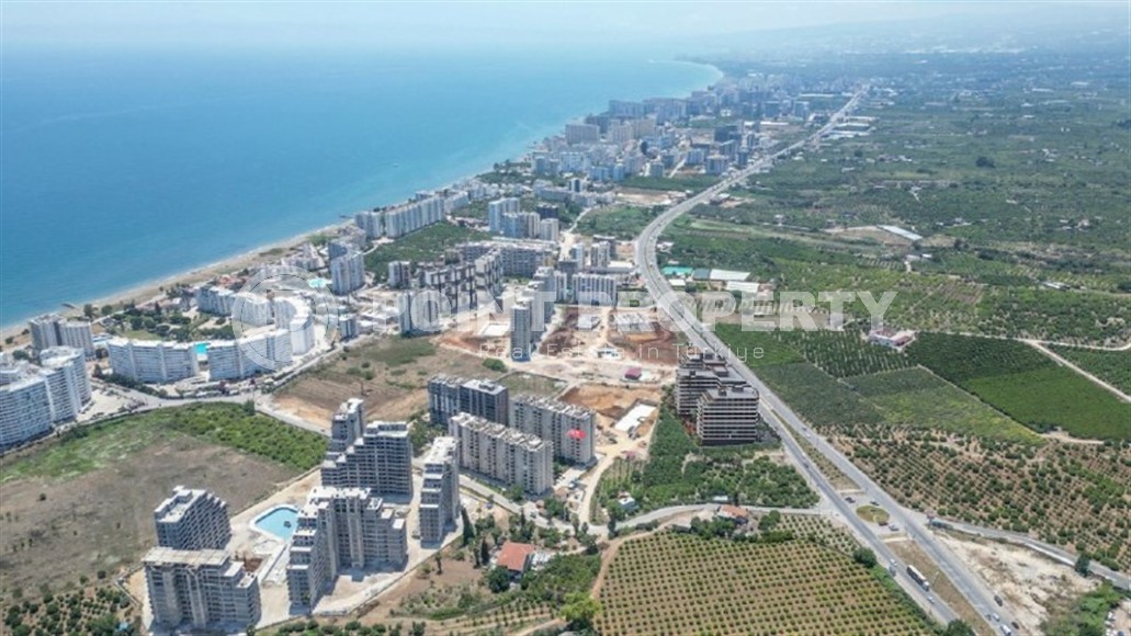 Новый инвестиционно-привлекательный проект в центре района Томюк, Мерсин-id-5367-фото-13