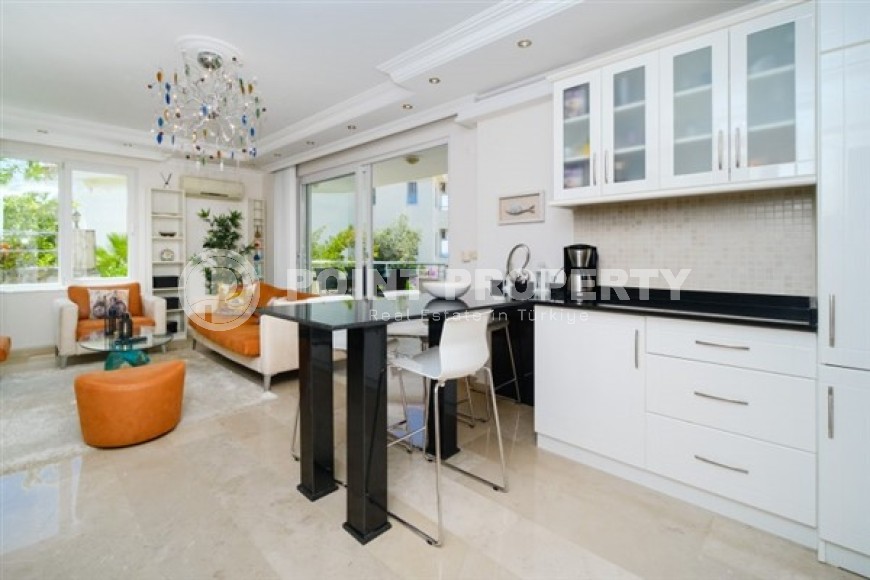 Двухуровневые апартаменты с двумя спальными комнатами и видом на Средиземное море, в районе Конаклы-id-5373-фото-2