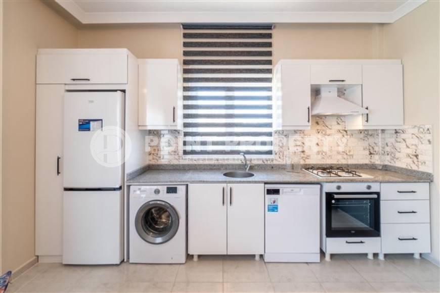 Меблированные апартаменты с двумя спальными комнатами в активно развивающемся районе города Аланья - Авсаллар-id-5376-фото-2