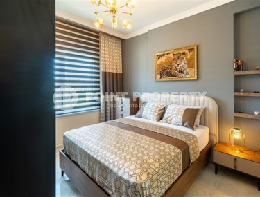 Меблированные апартаменты с двумя спальными комнатами в активно развивающемся районе города Аланья - Авсаллар-id-5376-фото-4