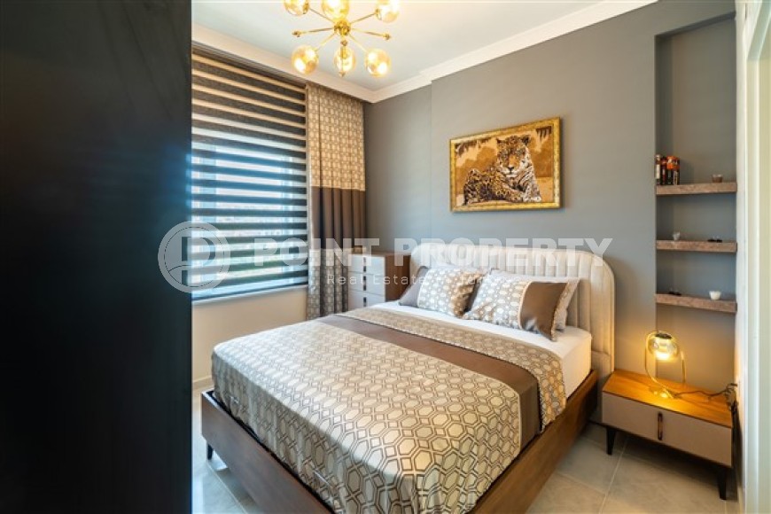 Меблированные апартаменты с двумя спальными комнатами в активно развивающемся районе города Аланья - Авсаллар-id-5376-фото-4