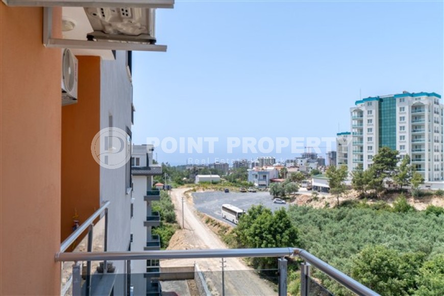 Меблированные апартаменты с двумя спальными комнатами в активно развивающемся районе города Аланья - Авсаллар-id-5376-фото-9