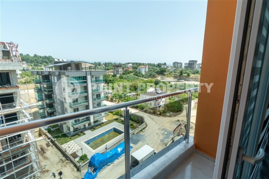 Меблированные апартаменты с двумя спальными комнатами в активно развивающемся районе города Аланья - Авсаллар-id-5376-фото-10