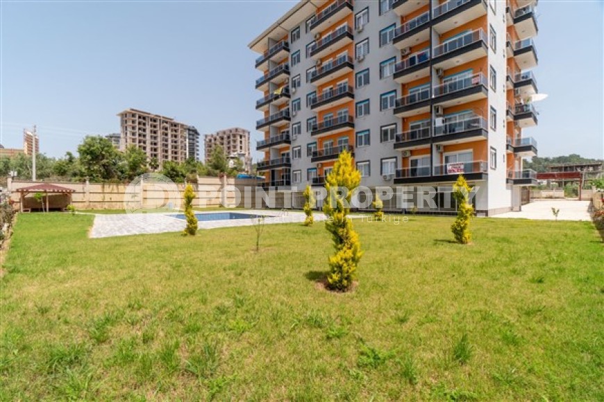 Меблированные апартаменты с двумя спальными комнатами в активно развивающемся районе города Аланья - Авсаллар-id-5376-фото-13