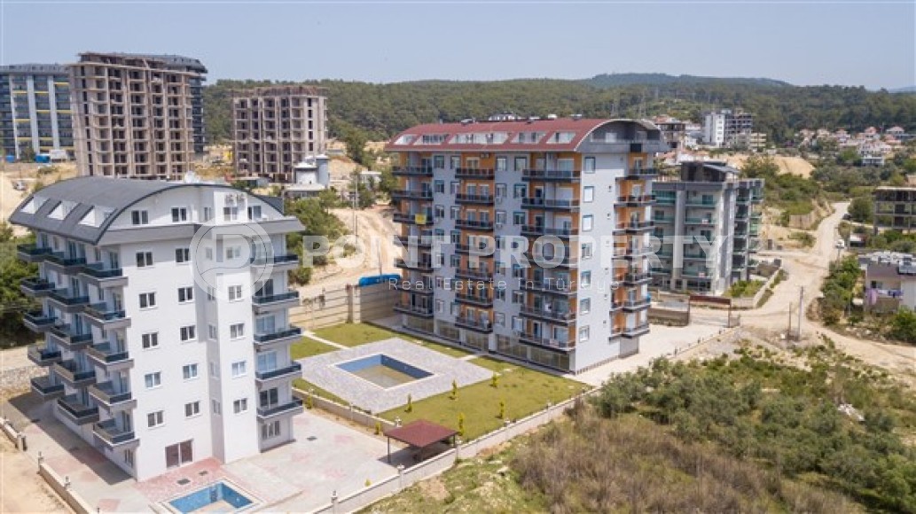 Меблированные апартаменты с двумя спальными комнатами в активно развивающемся районе города Аланья - Авсаллар-id-5376-фото-16