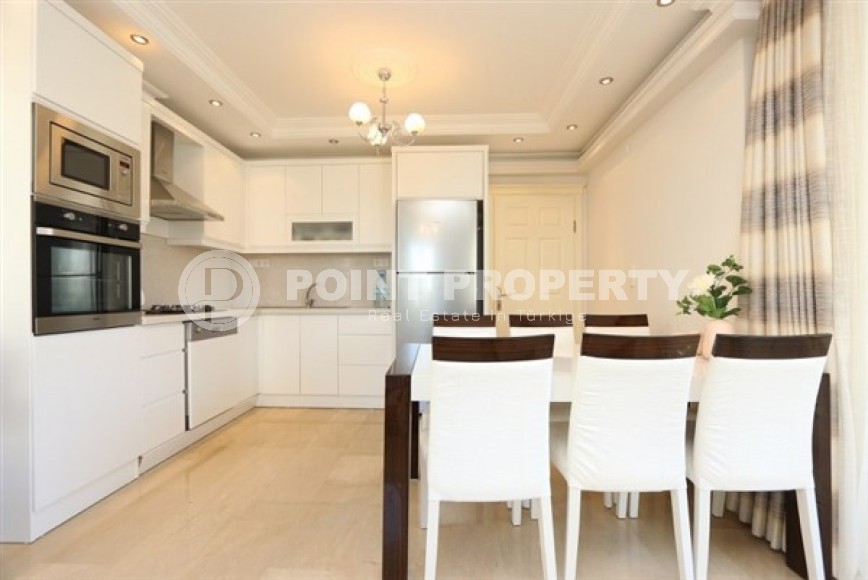 Двухуровневые апартаменты с тремя спальными комнатами и видовой террасой, рядом с морем в районе Конаклы-id-5380-фото-2