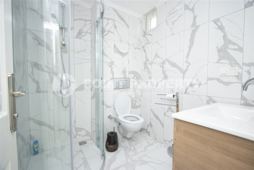 Двухуровневые апартаменты с тремя спальными комнатами и видовой террасой, рядом с морем в районе Конаклы-id-5380-фото-12